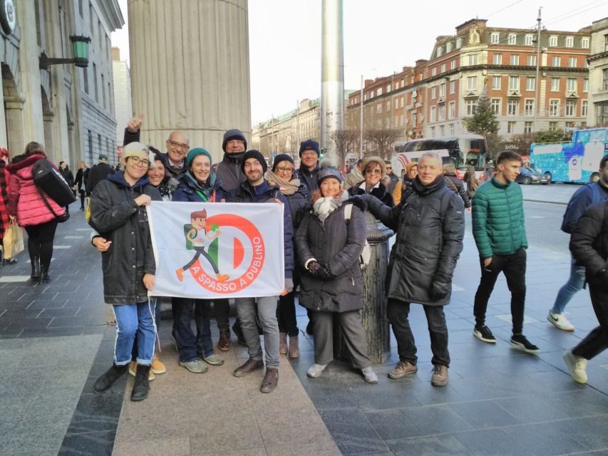 Dublin Highlights: 2.45-Hour Walking Tour in Italian - Crossing the Liffey on Ha’penny Bridge and spotting the GPO